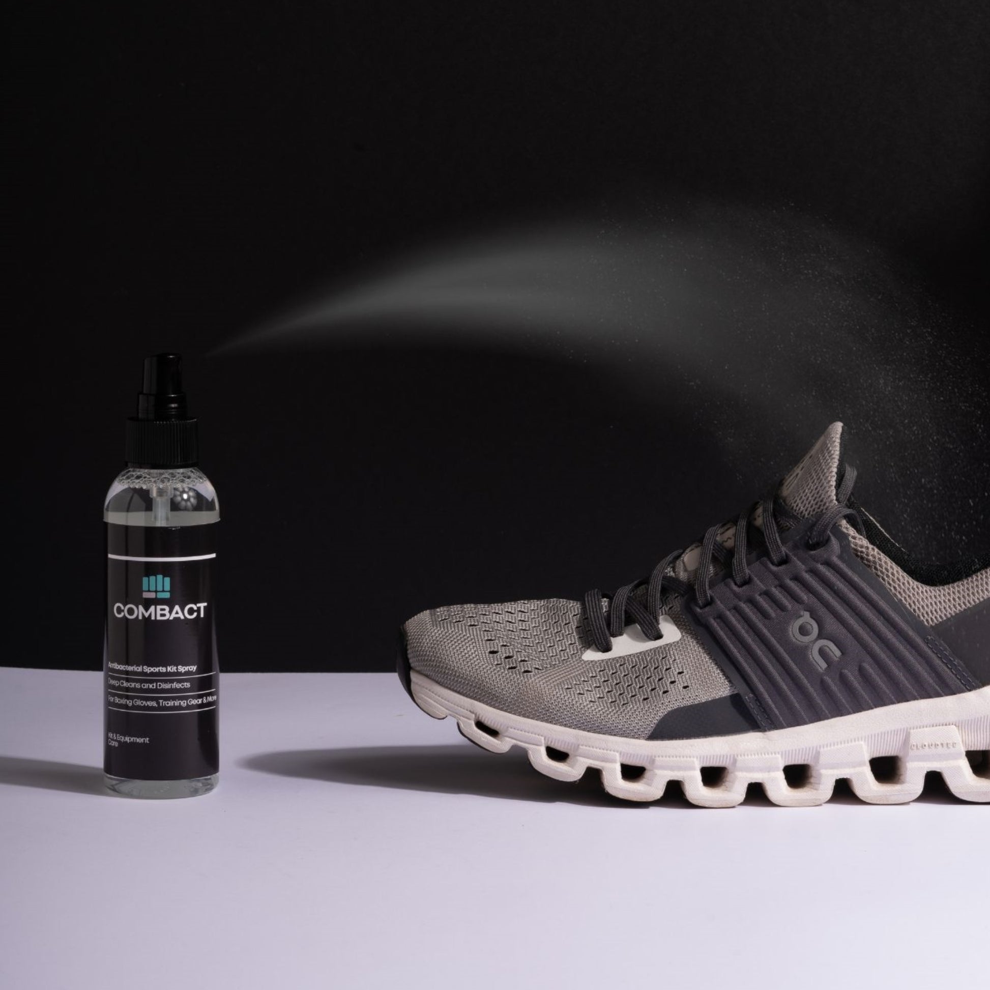 Image of Combact Antibacterial Sports Kit Spray being used to Deodorise a pair of running trainers. Used as Running Trainer Antibacterial Deodorizer Spray