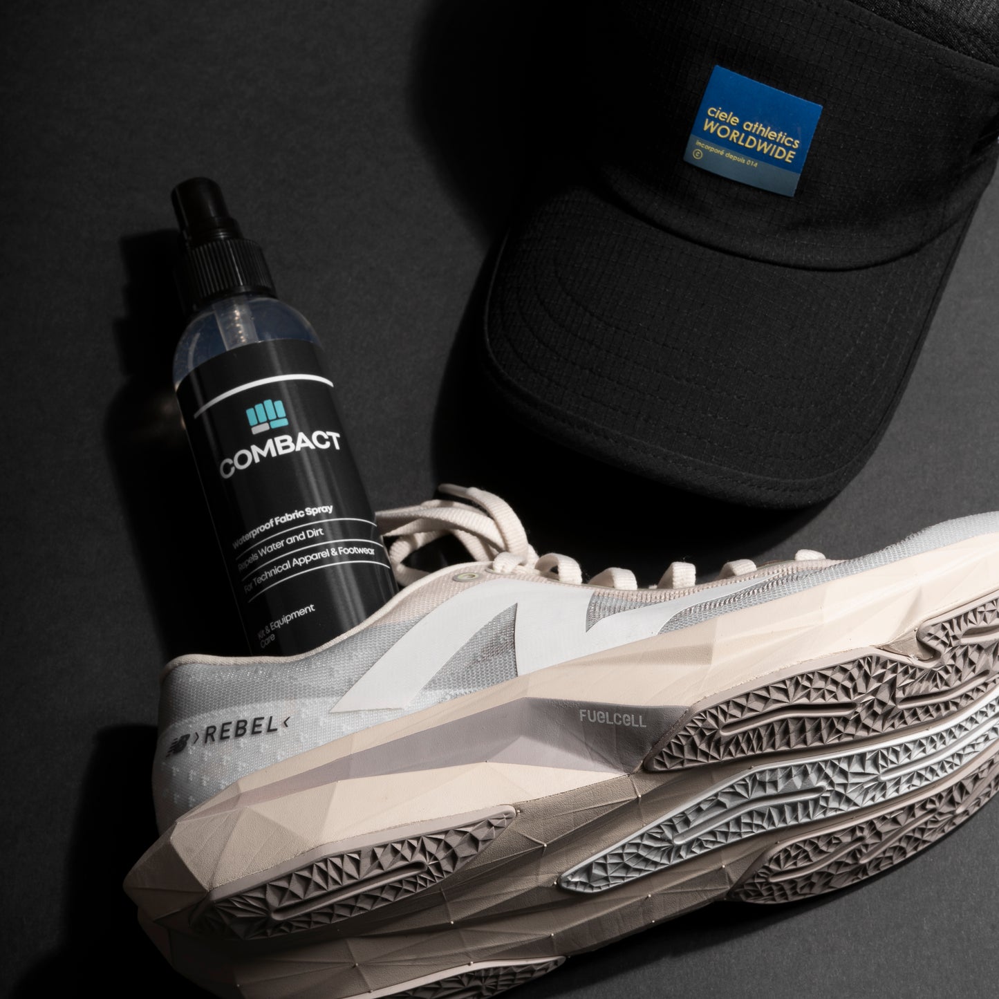 Professional photograph of Combact Waterproof Fabric Spray. Used as a waterproofing running trainer spray, and a running trainer protector